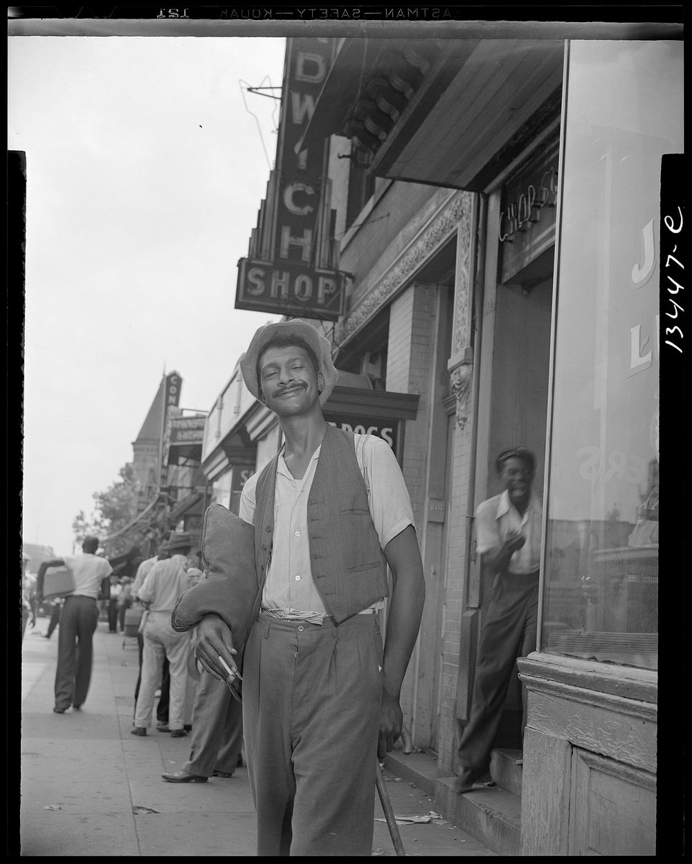 Washington, D.C. Panhandler on 7th Street, N.W.. Sourced from the Library of Congress.