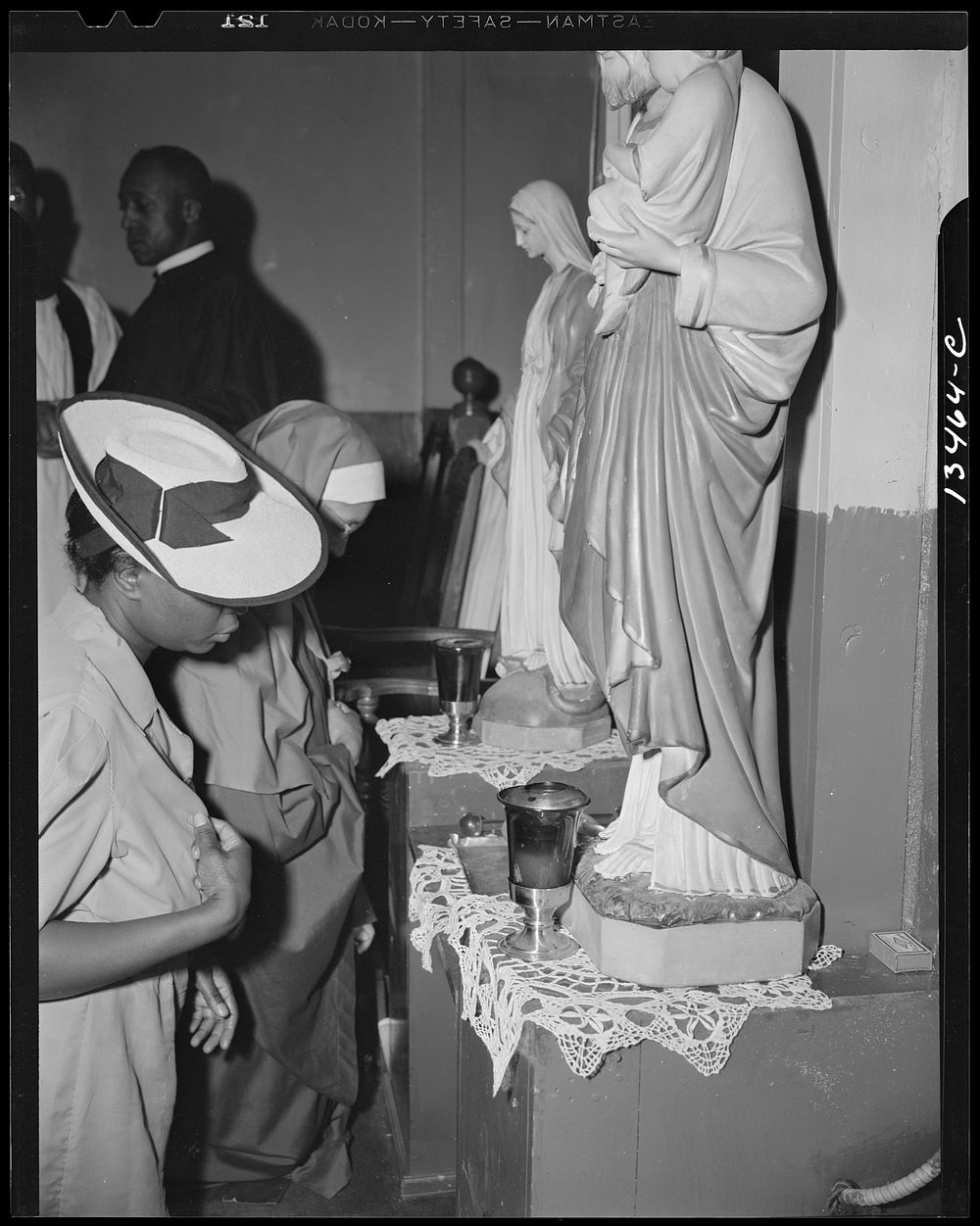 Washington, D.C. Worshippers before the altar in the St. Martin's Spiritual Church. Sourced from the Library of Congress.