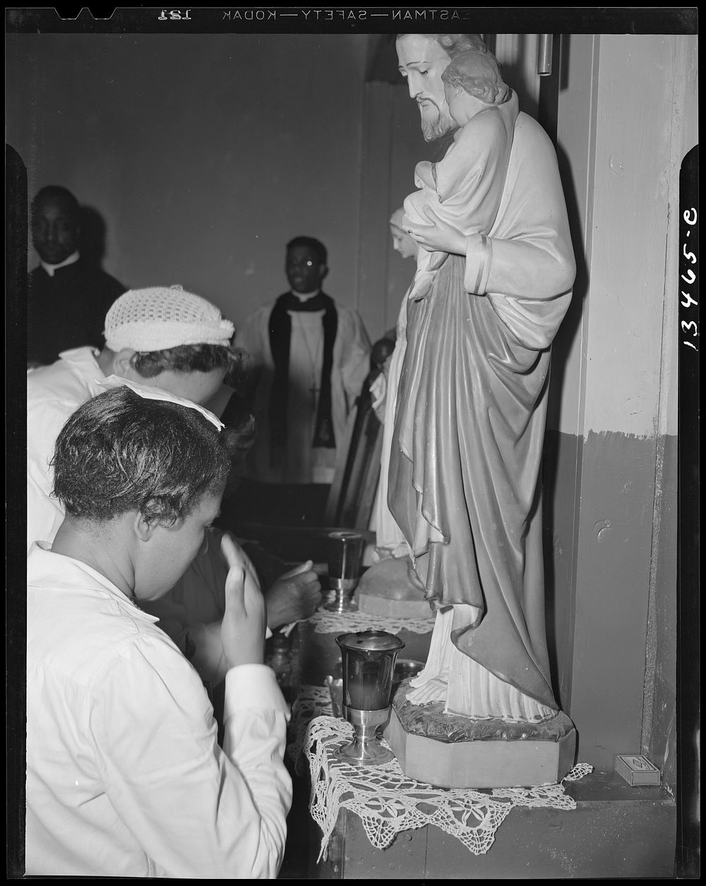 Washington, D.C. Worshippers before the altar in the St. Martin's Spiritual Church. Sourced from the Library of Congress.