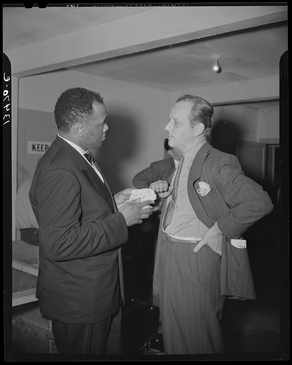 Washington, D.C. Russian war anniversary benefit at the Watergate. Melvyn Douglas and Paul Robeson backstage. Sourced from…