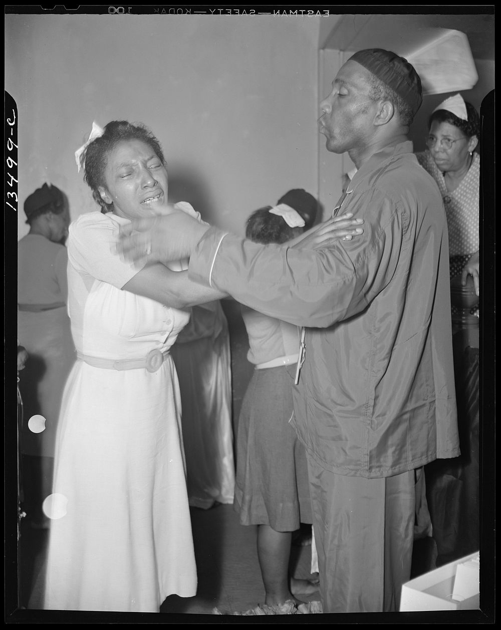 Washington, D.C. A member of the St. Martin's Spiritual Church, receiving the final blessing of a flower from Reverend…
