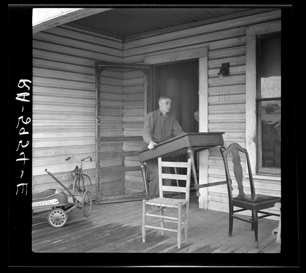 [Untitled photo, possibly related to: The Eargle Family moving their household goods out of their home at Fairfield…