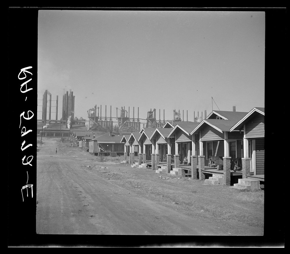 [Untitled photo, possibly related to: Company houses near steel mills. Ensley, Alabama]. Sourced from the Library of…