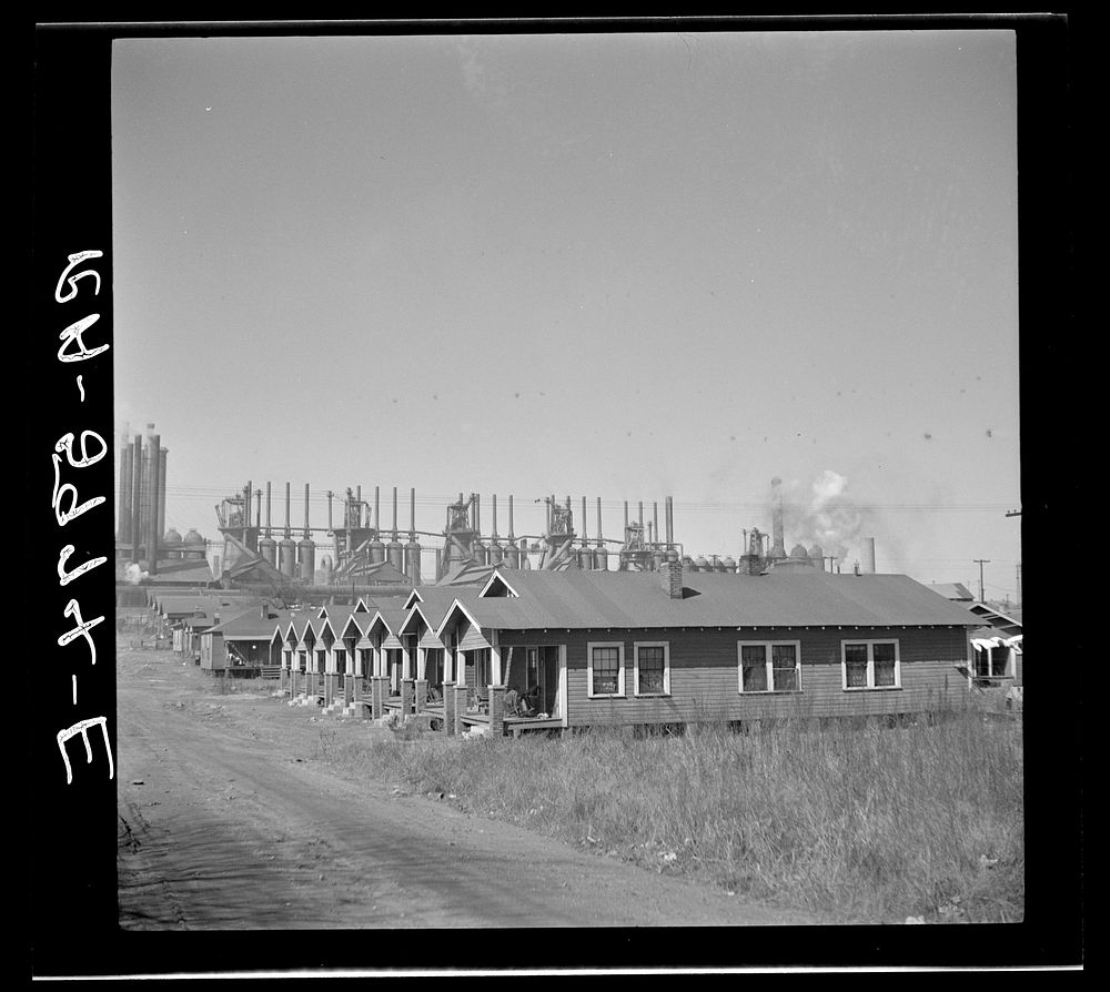 [Untitled photo, possibly related to: Company houses near steel mills. Ensley, Alabama]. Sourced from the Library of…