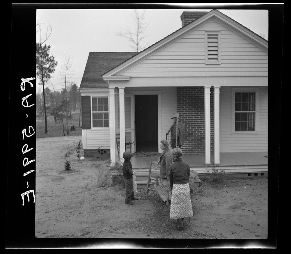 [Untitled photo, possibly related to: The Eargle family moving into their new home at Gardendale Homesteads, Alabama].…