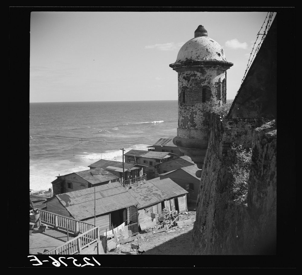 [Untitled photo, possibly related to: View of a portion of the workers' quarter of La Perla from the old Spanish ramparts.…
