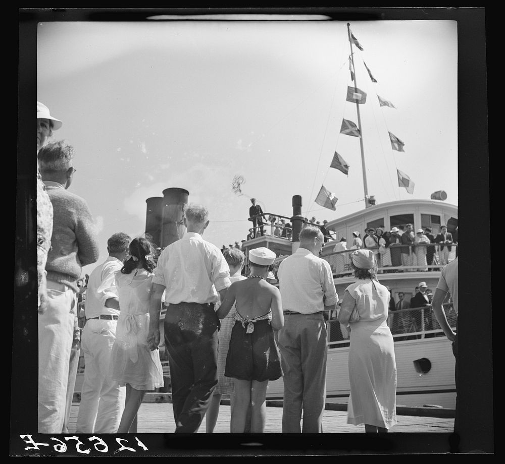 [Untitled photo, possibly related to: Tourists getting aboard the "Steel Pier" on their return trip to Boston. During the…