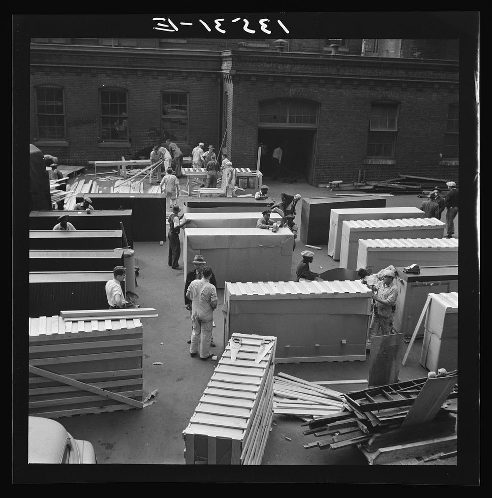 [Untitled photo, possibly related to: Washington, D.C. United States government workers and carpenters making crates for…