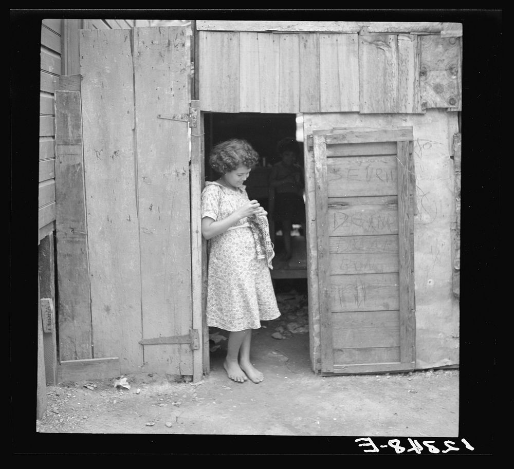 [Untitled photo, possibly related to: Homework in the so-called needlework industry. Ponce, Puerto Rico]. Sourced from the…