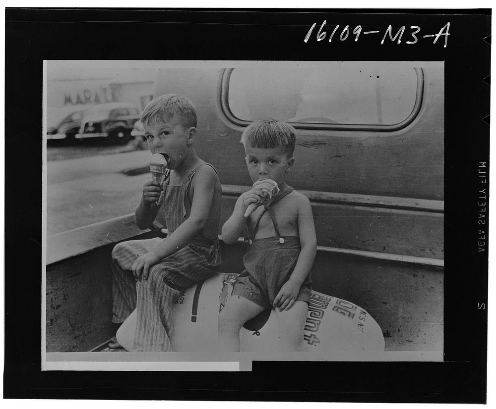 Farm boys eating ice-cream cones. Washington, Indiana. Sourced from the Library of Congress.