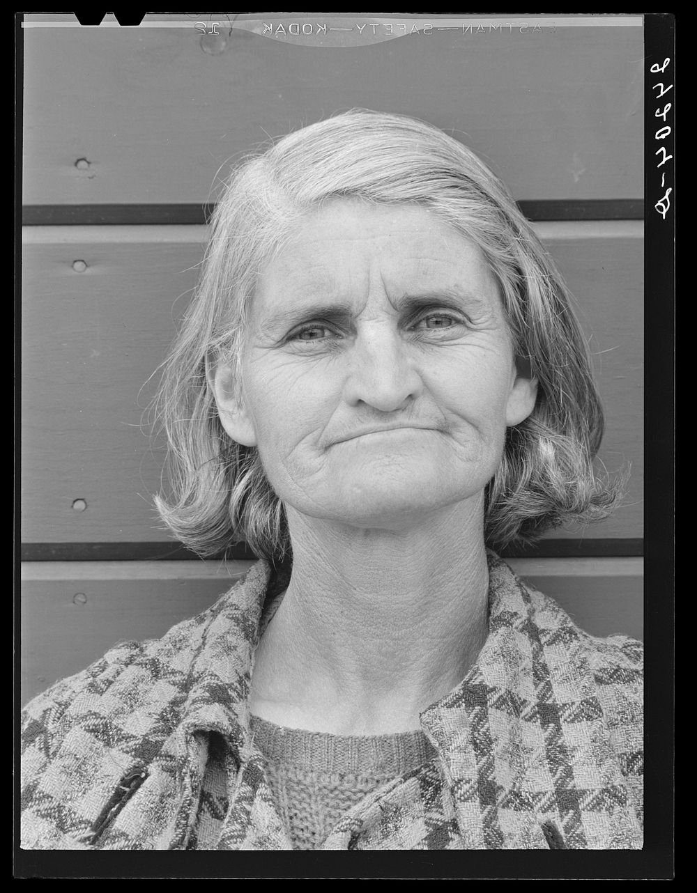 Wife of migrant. Tulare migrant camp. Visalia, California. Sourced from the Library of Congress.
