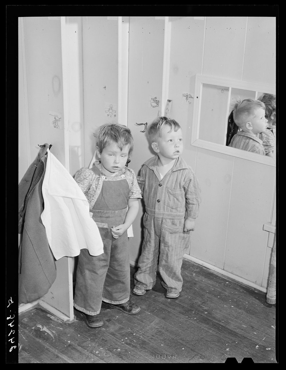 Children in nursery just awakened from afternoon nap. Shafter migrant camp. Shafter, California. Sourced from the Library of…