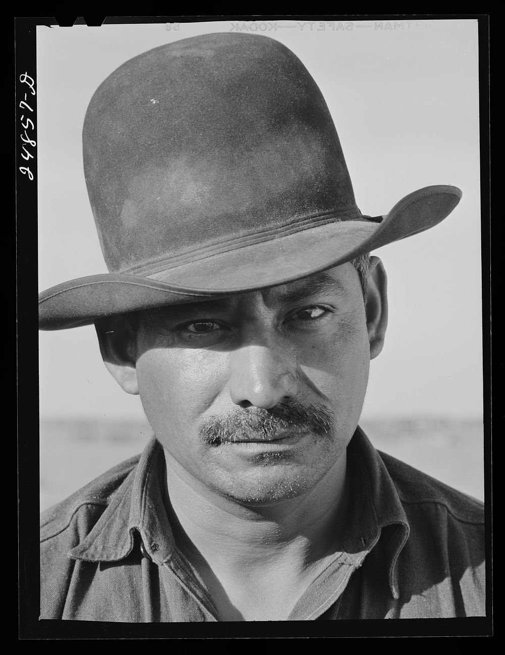 [Untitled photo, possibly related to: Migratory farm worker. Robstown camp, Robstown, Texas]. Sourced from the Library of…