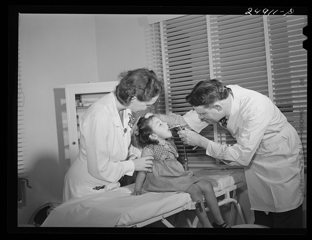 [Untitled photo, possibly related to: Nurse Doris Dill with young patient. Robstown, Texas]. Sourced from the Library of…
