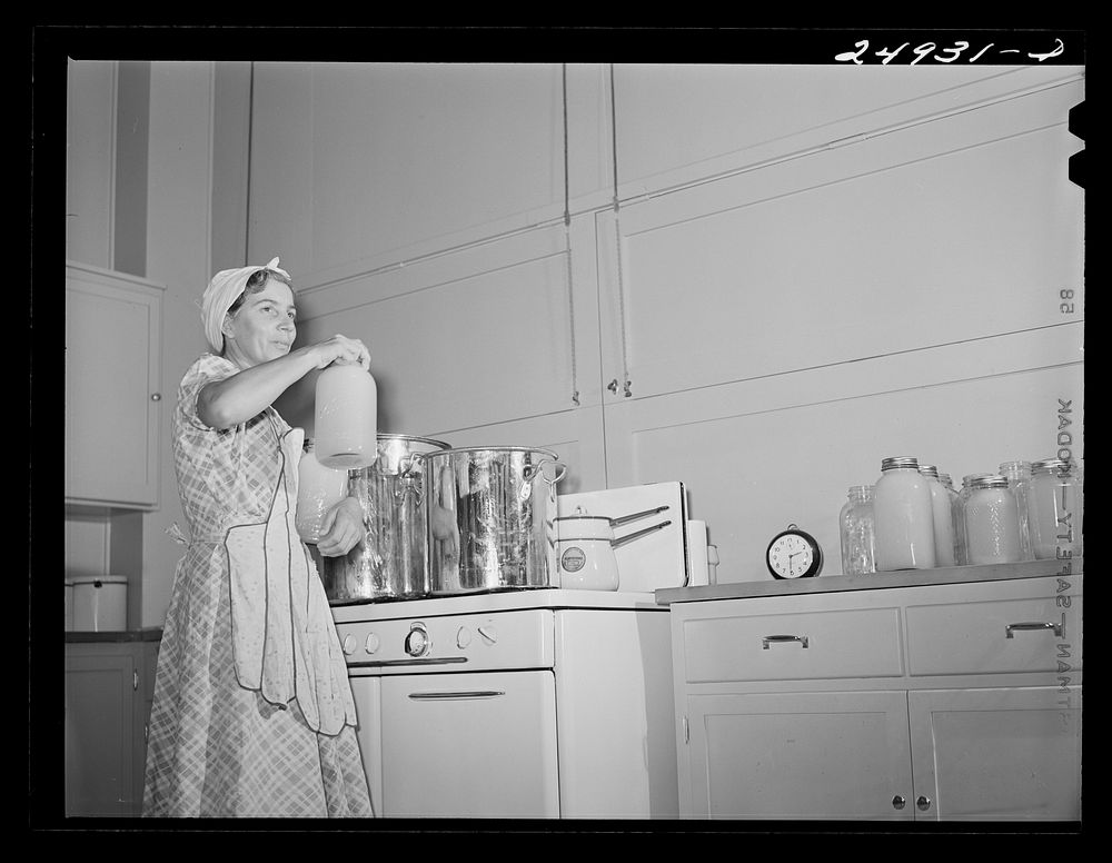 Harlingen, Texas. FSA (Farm Security Administration) camp. Canning grapefruit for hot weather use in community kitchen.…
