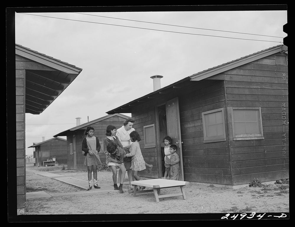 Harlingen, Texas. FSA (Farm Security Administration) camp. Nurse taking a boy with a fractured leg out for air. Sourced from…