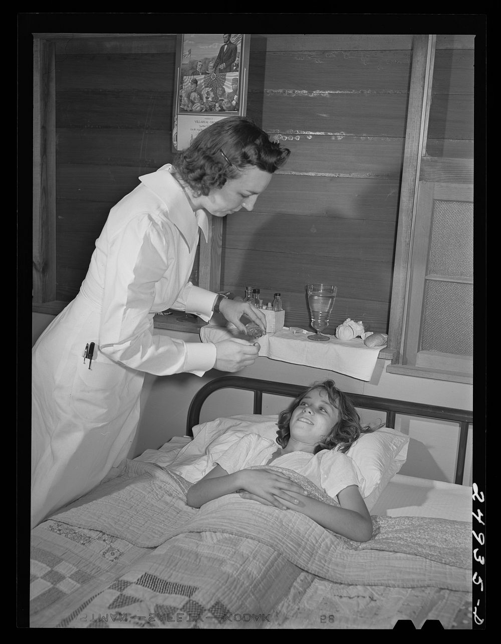 Harlingen, Texas. FSA (Farm Security Administration) camp. Nurse on home visit to child recovering from pneumonia. Sourced…