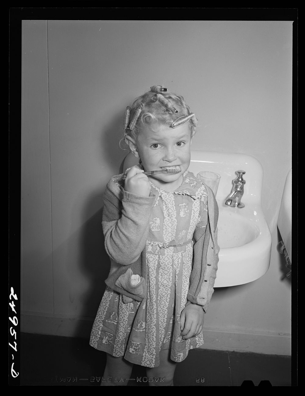 Harlingen, Texas. FSA (Farm Security Administration) camp. Morning routine at nursery school. Sourced from the Library of…