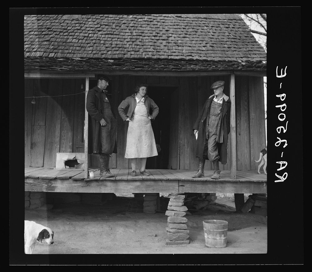 [Untitled photo, possibly related to: Tenant farmer at well. Walker County, Alabama]. Sourced from the Library of Congress.