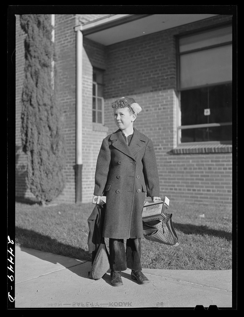 Principal's son on way home from nursery school. Homestead school. Dailey, West Virginia. Sourced from the Library of…