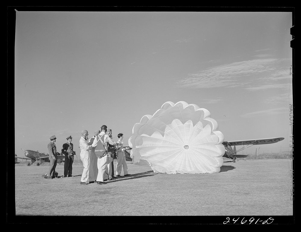 Fort Worth, Texas. Meacham Field. Students learning operation of parachute. Sourced from the Library of Congress.
