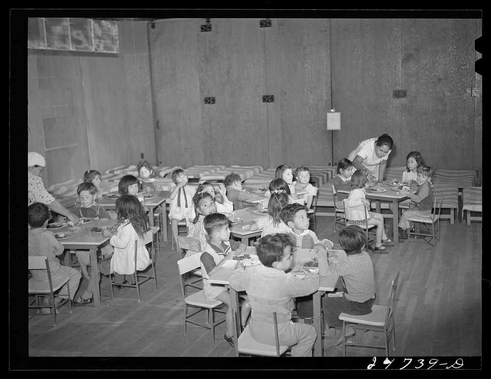 [Untitled photo, possibly related to: Members of mother's committee serve lunch at nursery school. FSA (Farm Security…