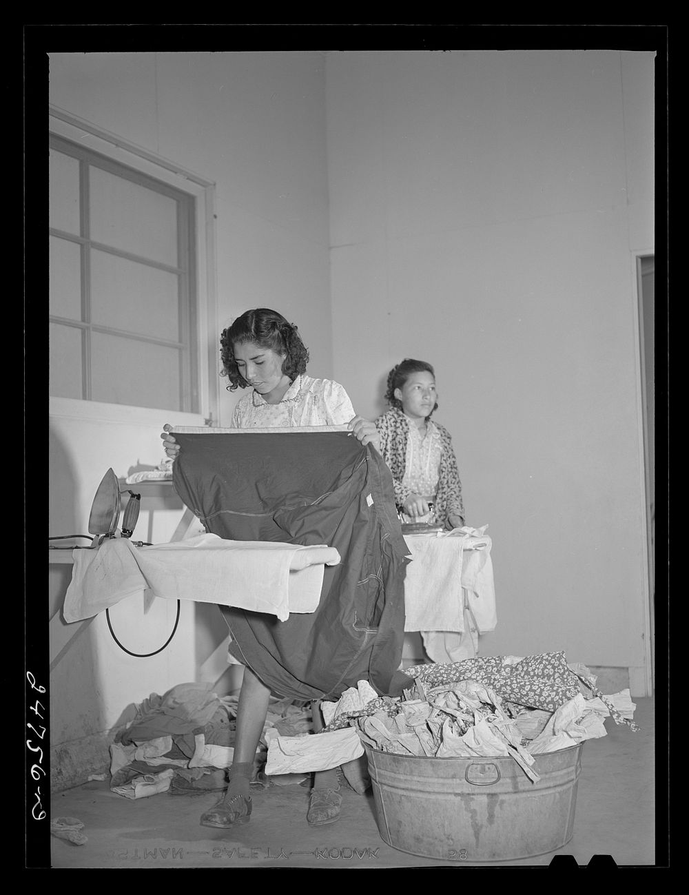 Ironing room, Robstown, Texas. FSA (Farm Security Administration) camp. Sourced from the Library of Congress.