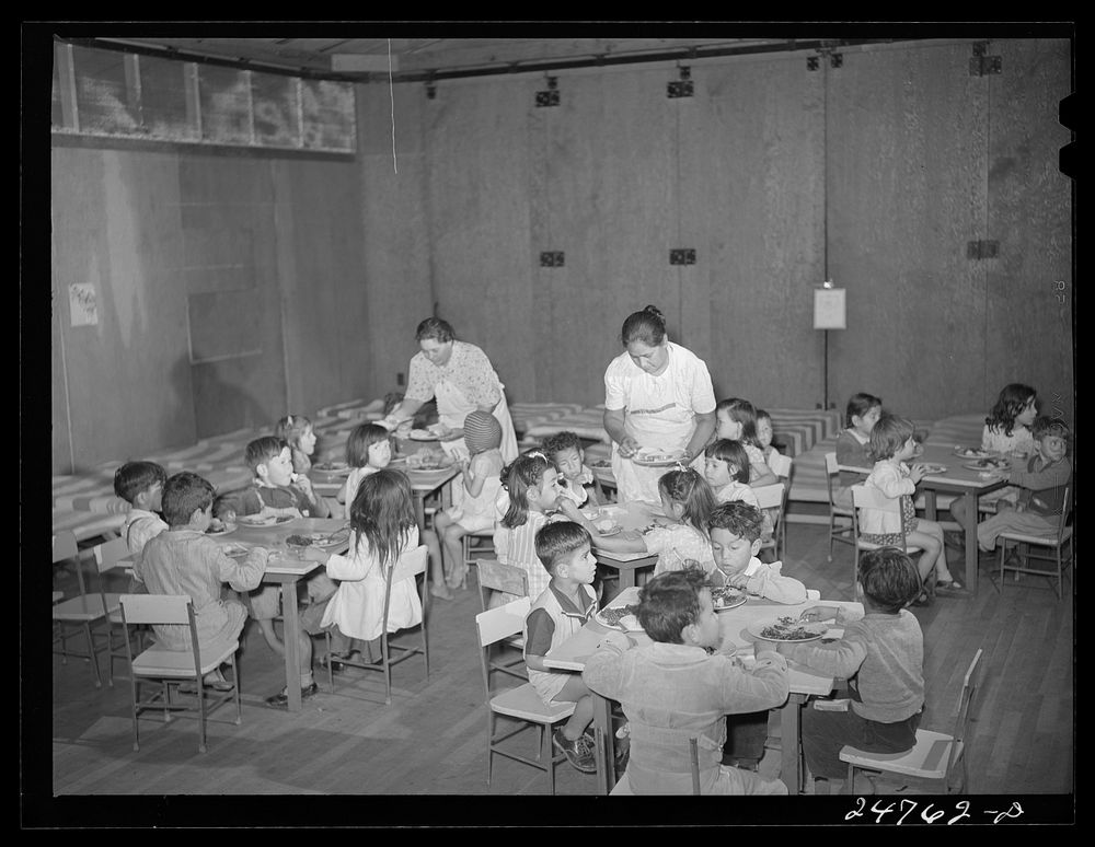 Members of mother's committee serve lunch at nursery school. FSA (Farm Security Administration) camp. Robstown, Texas.…