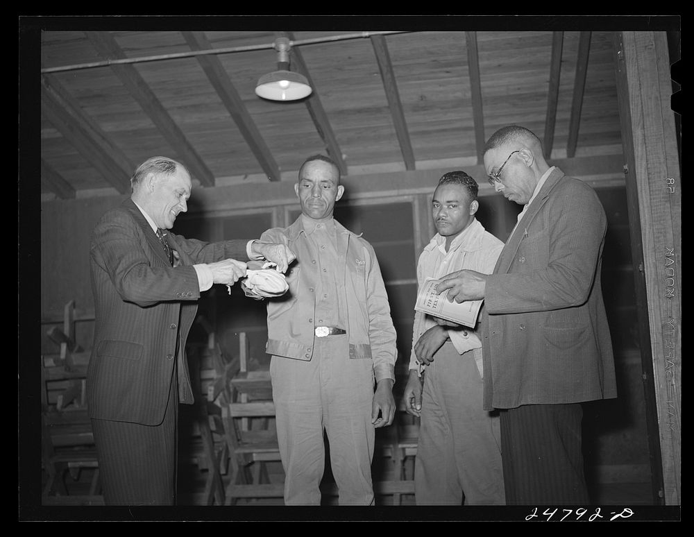 [Untitled photo, possibly related to: First aid classes at community center. FSA (Farm Security Administration) camp…
