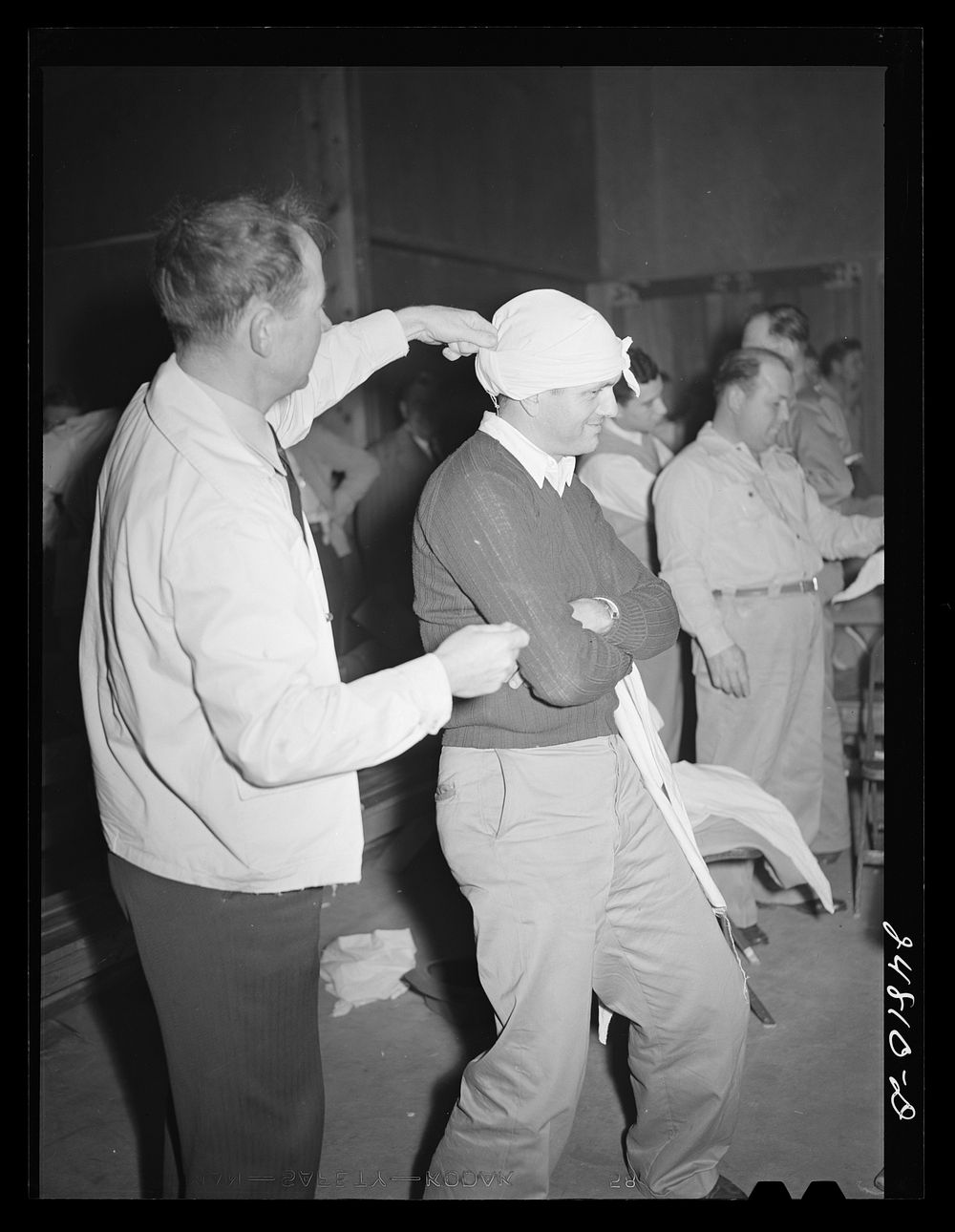 [Untitled photo, possibly related to: First aid class FSA (Farm Security Administration) camp, Robstown, Texas]. Sourced…