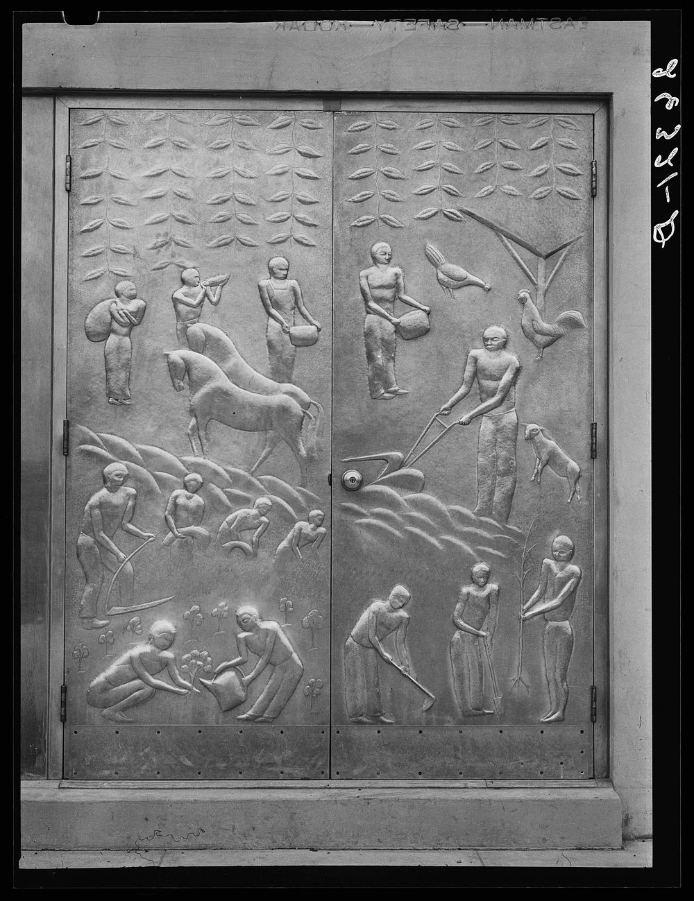 Doors at the Hightstown community building, New Jersey. Sourced from the Library of Congress.
