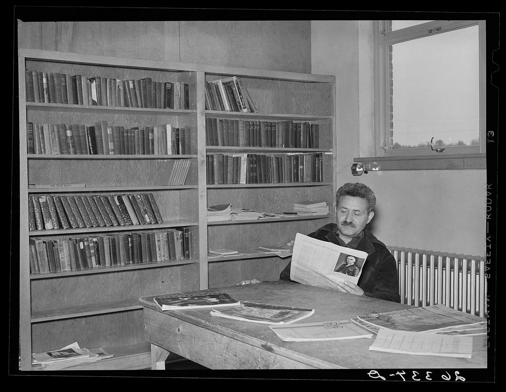 Homesteader in the library. Jersey Homesteads, Hightstown, New Jersey. Sourced from the Library of Congress.