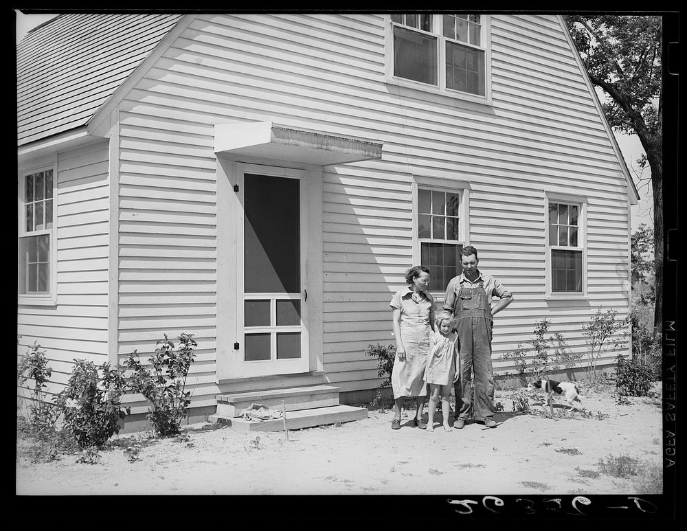 Member of cooperative, with wife and daughter. Wabash Farms, Indiana. Sourced from the Library of Congress.