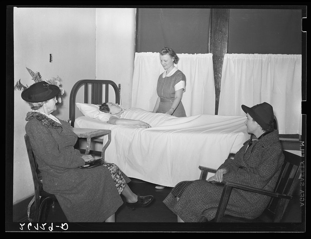 Relatives visiting a maternity case. Herrin Hospital (private). Herrin, Illinois. Sourced from the Library of Congress.