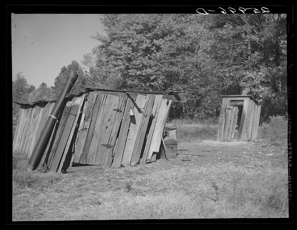 Outhouses on farm of prospective tenant of Newport News Homesteads. Newport News, Virginia. Sourced from the Library of…
