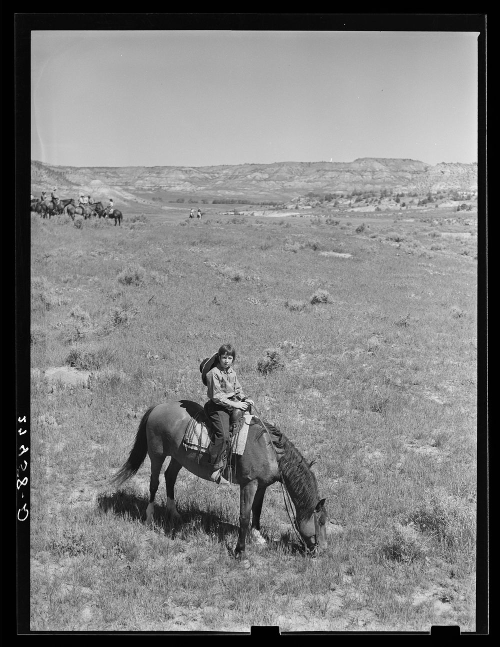 Dude girl. Quarter Circle 'U' Ranch, Montana. Sourced from the Library of Congress.