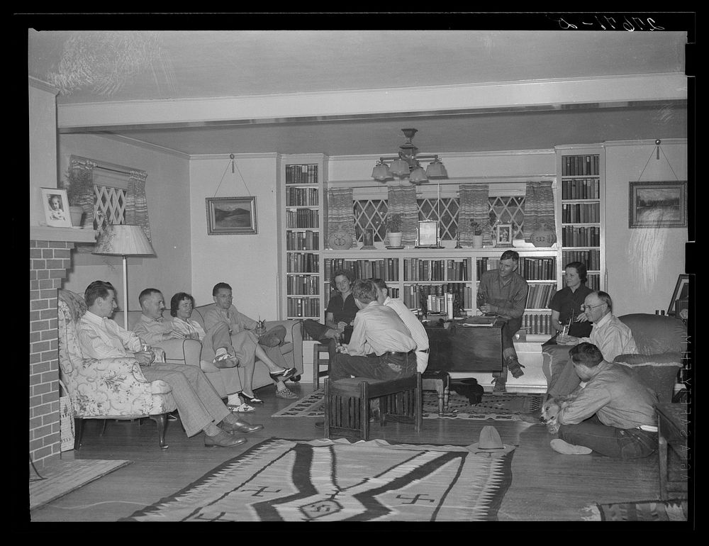 Dudes in living room of main house. Quarter Circle 'U' Ranch, Montana. Sourced from the Library of Congress.