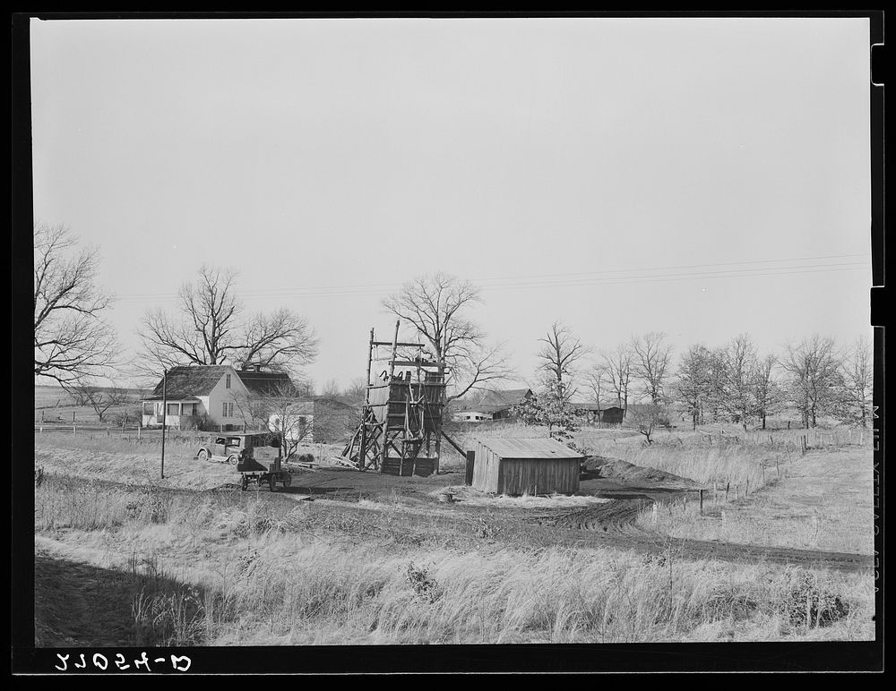 Farm on which a gopher hole has been placed, with agriculture giving way to coal mining. Williamson County, Illinois.…