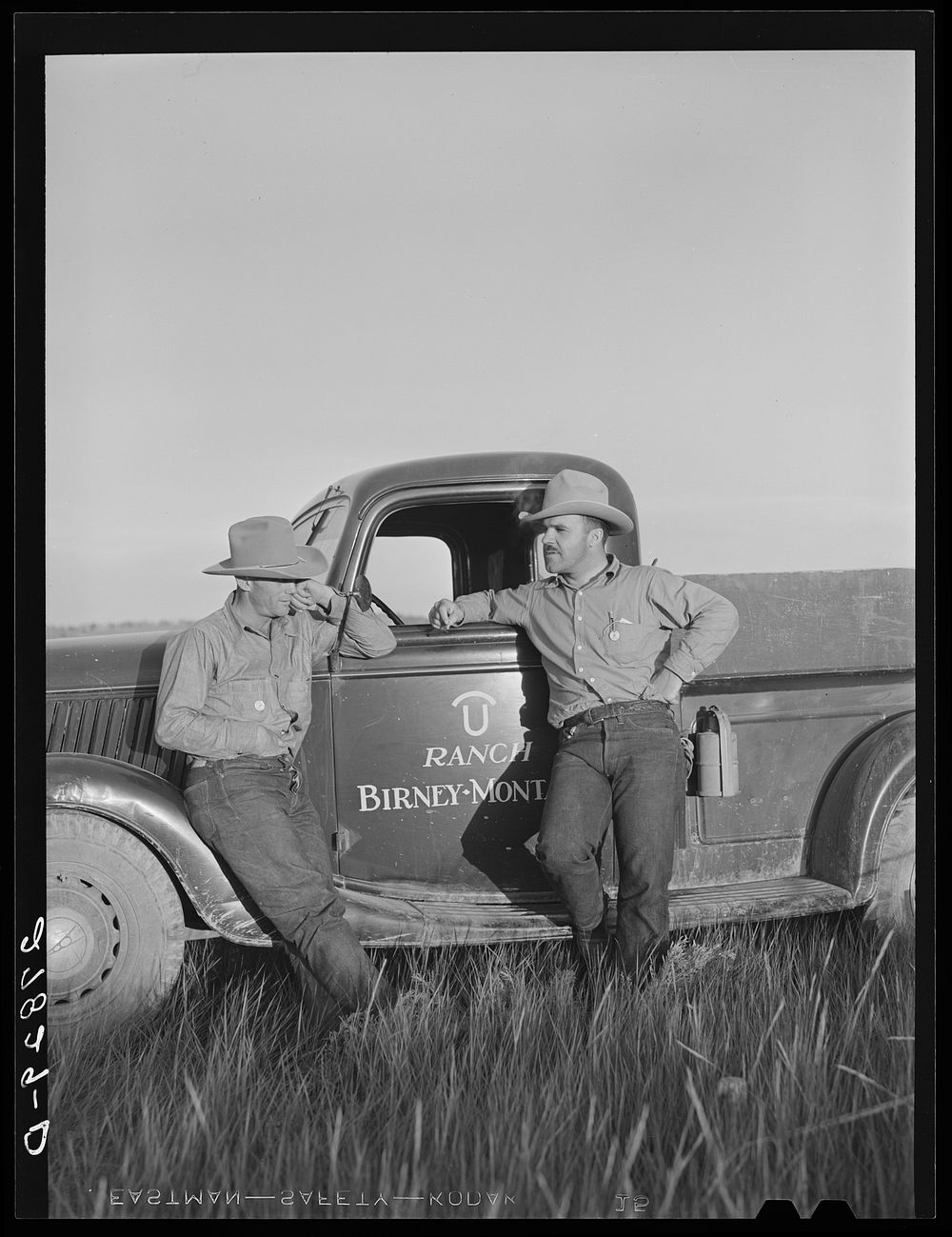 Rancher and cowhand. Quarter Circle 'U' Ranch, Big Horn County, Montana. Sourced from the Library of Congress.