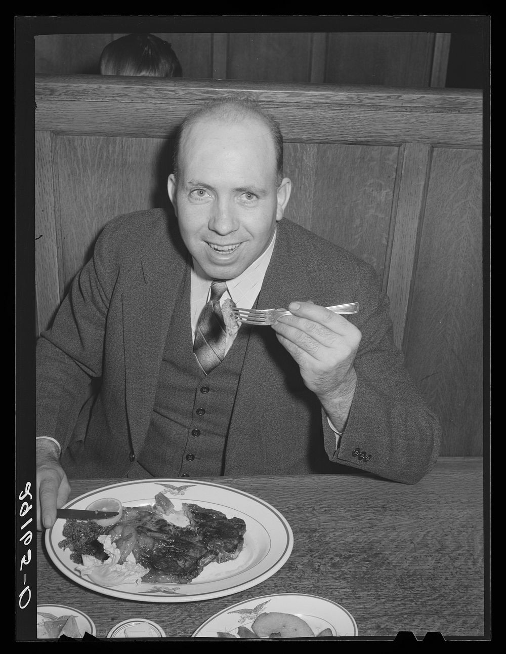 Diner with steak. Scotts Bluff, Nebraska. Sourced from the Library of Congress.