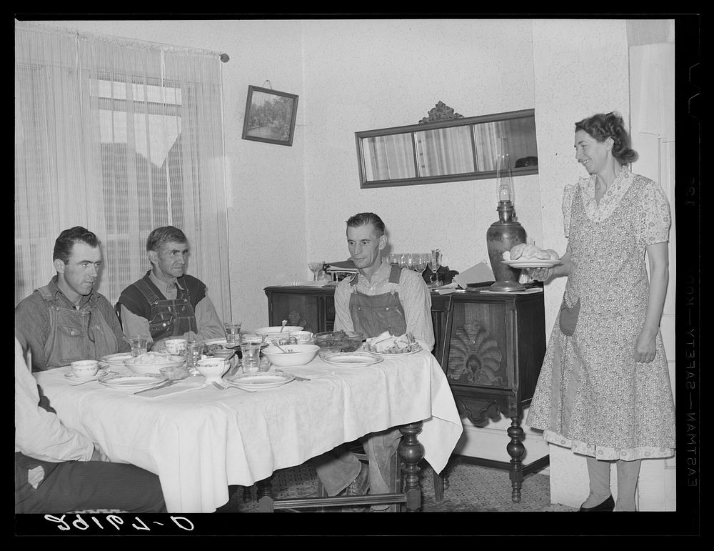 Farmers at dinner. Greene County, Missouri. Sourced from the Library of Congress.