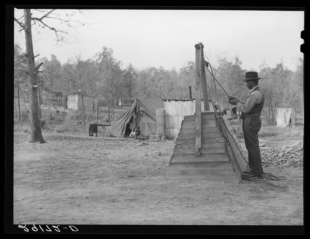 Evicted sharecropper at well. Butler County, Missouri. Sourced from the Library of Congress.
