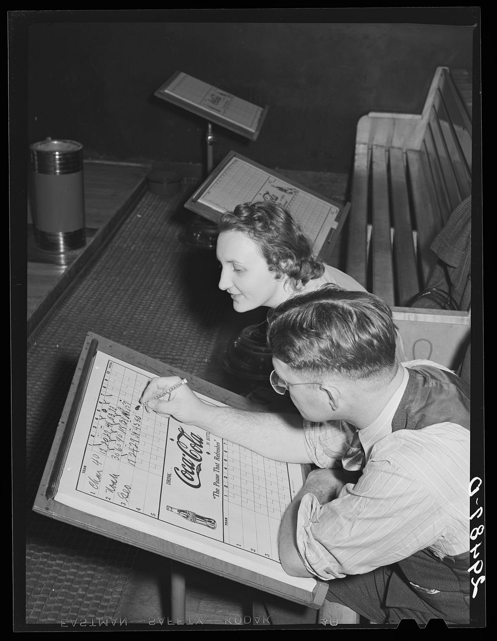 Keeping score. Bowling alley, Clinton, Indiana. Sourced from the Library of Congress.