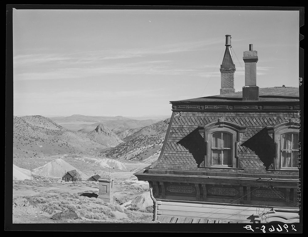 Corner of old mine office, abandoned mines in distance. Virginia City, Nevada. Sourced from the Library of Congress.