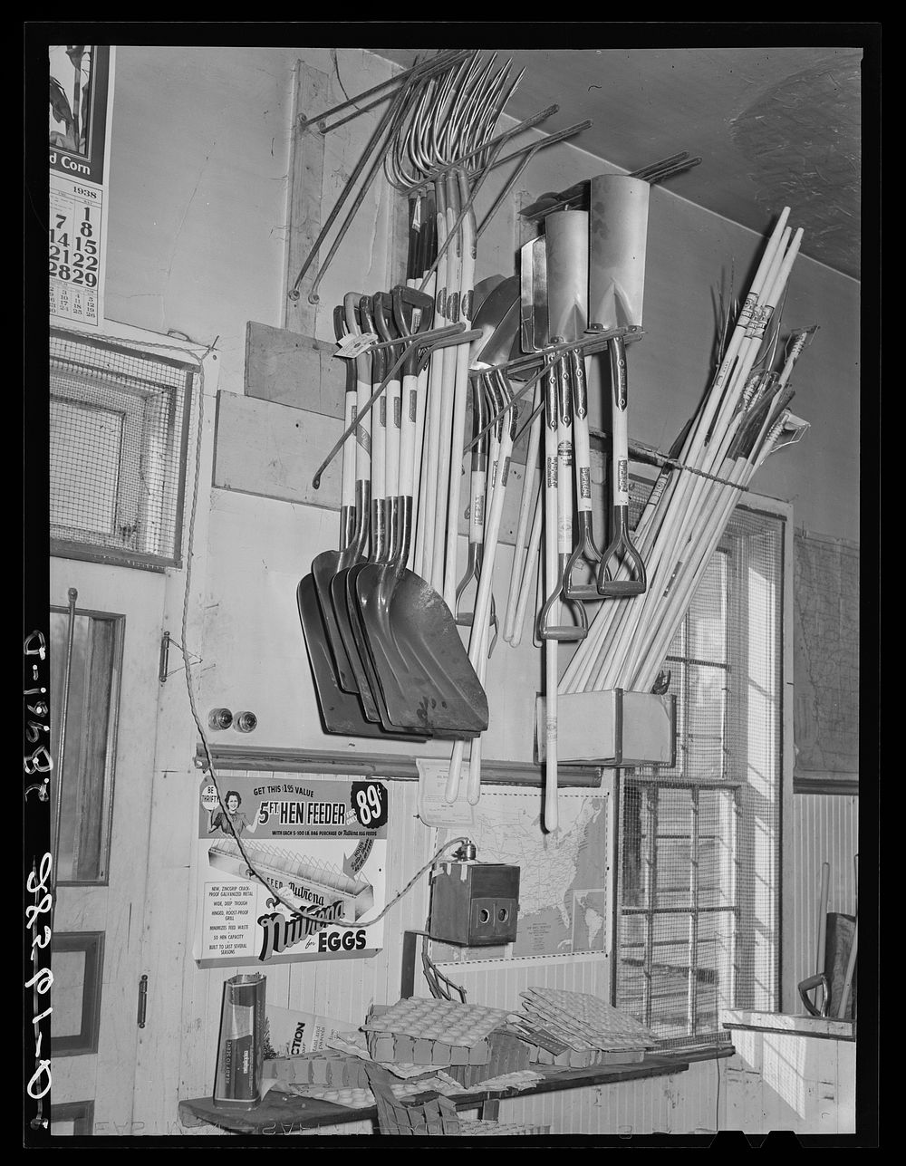 Farm implements and egg candler. General store. Lamoille, Iowa. Sourced from the Library of Congress.