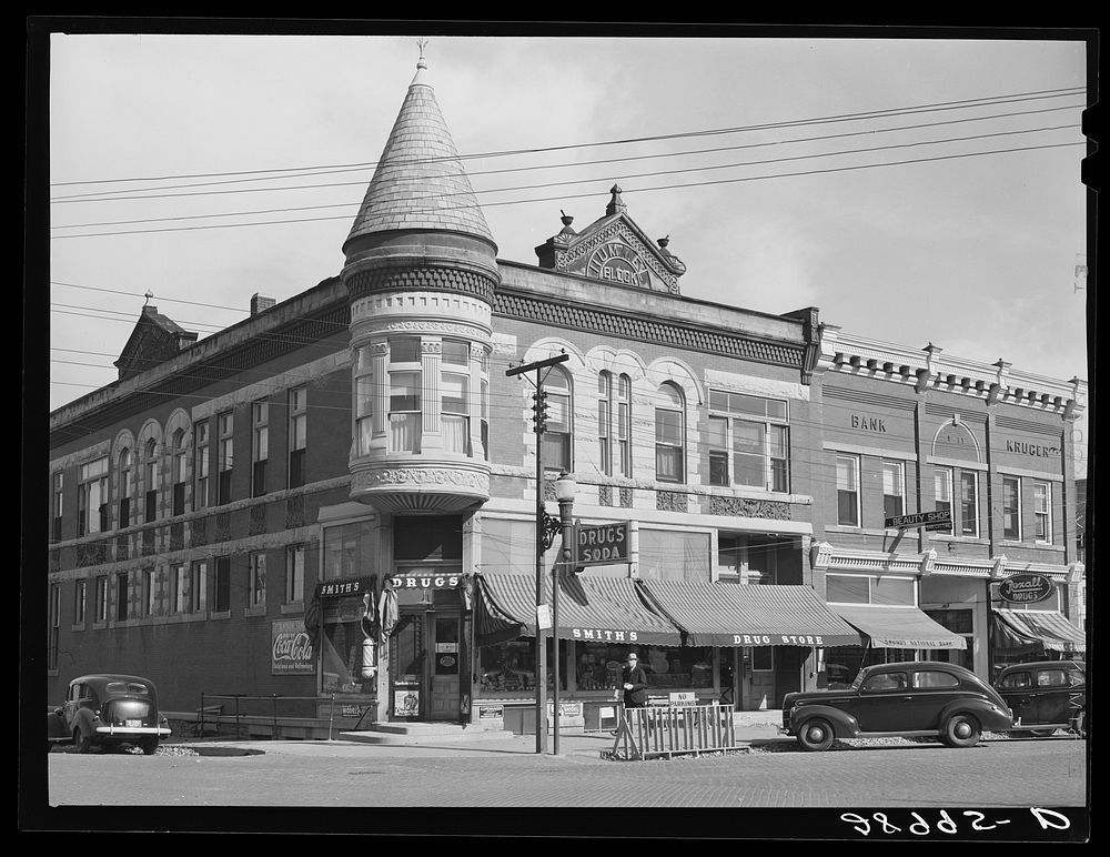Stores on main street. Grundy Center, Iowa. Sourced from the Library of Congress.