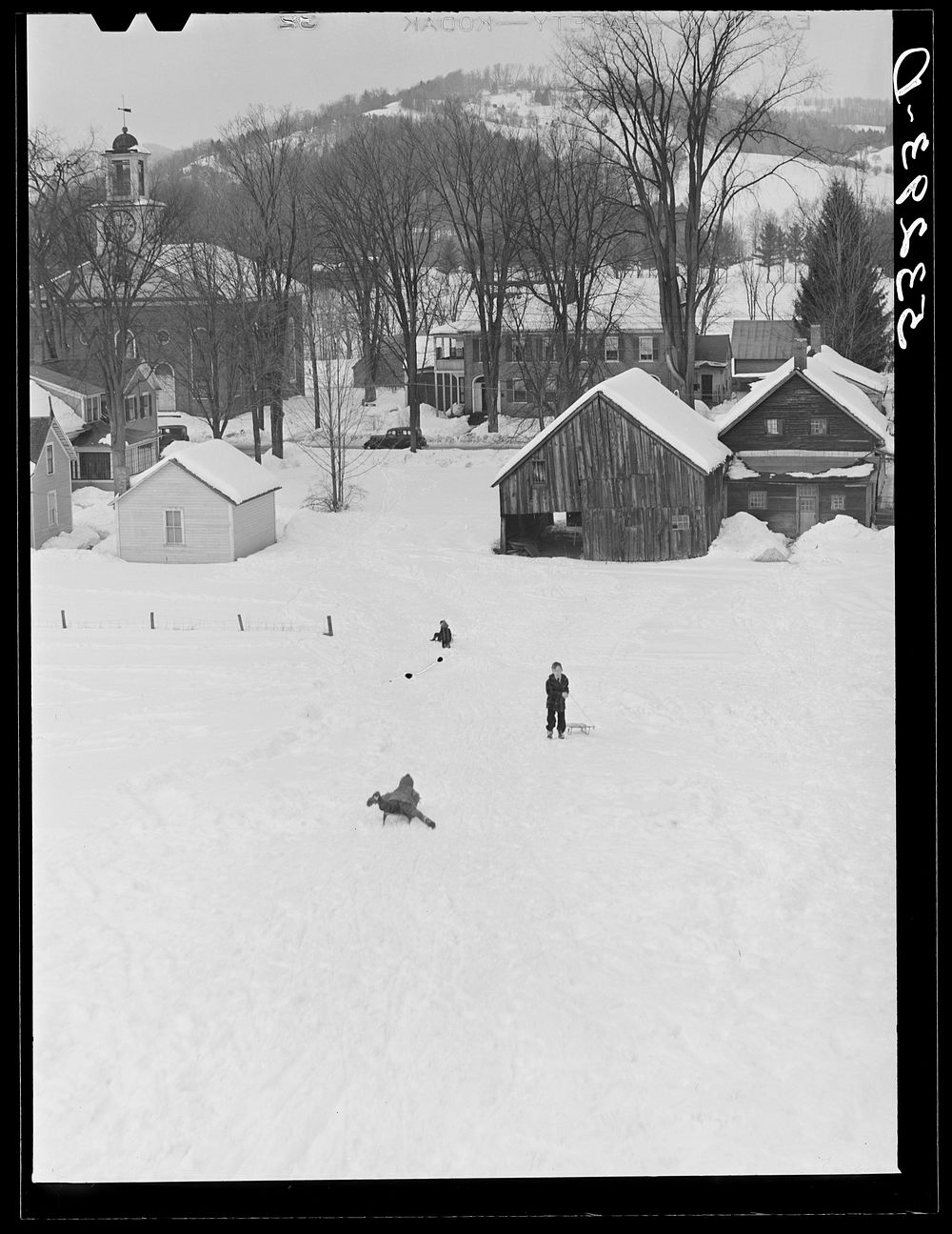 Children sleigh riding. Woodstock, Vermont. Sourced from the Library of Congress.