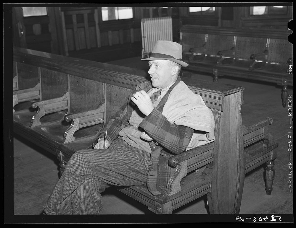 [Untitled photo, possibly related to: Postmaster waiting for train to arrive. Railway station, Mount Whittier, New…