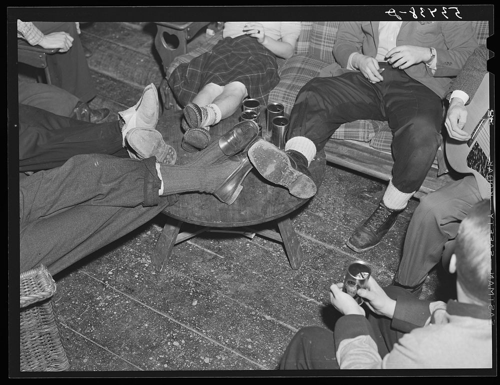 Skiers relaxing in lodge living room at North Conway, New Hampshire. Sourced from the Library of Congress.