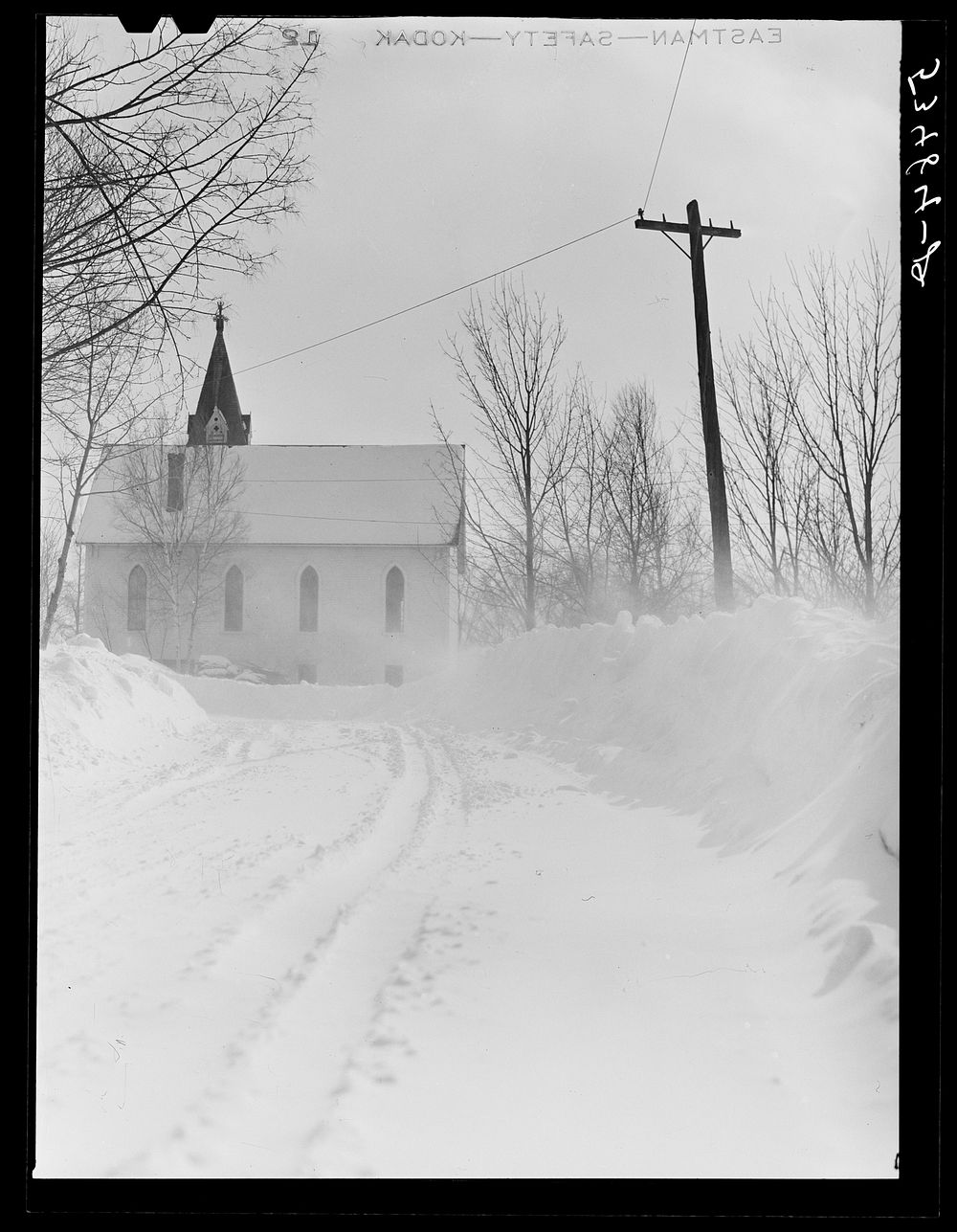 Highway and church near Littleton, New Hampshire. Sourced from the Library of Congress.